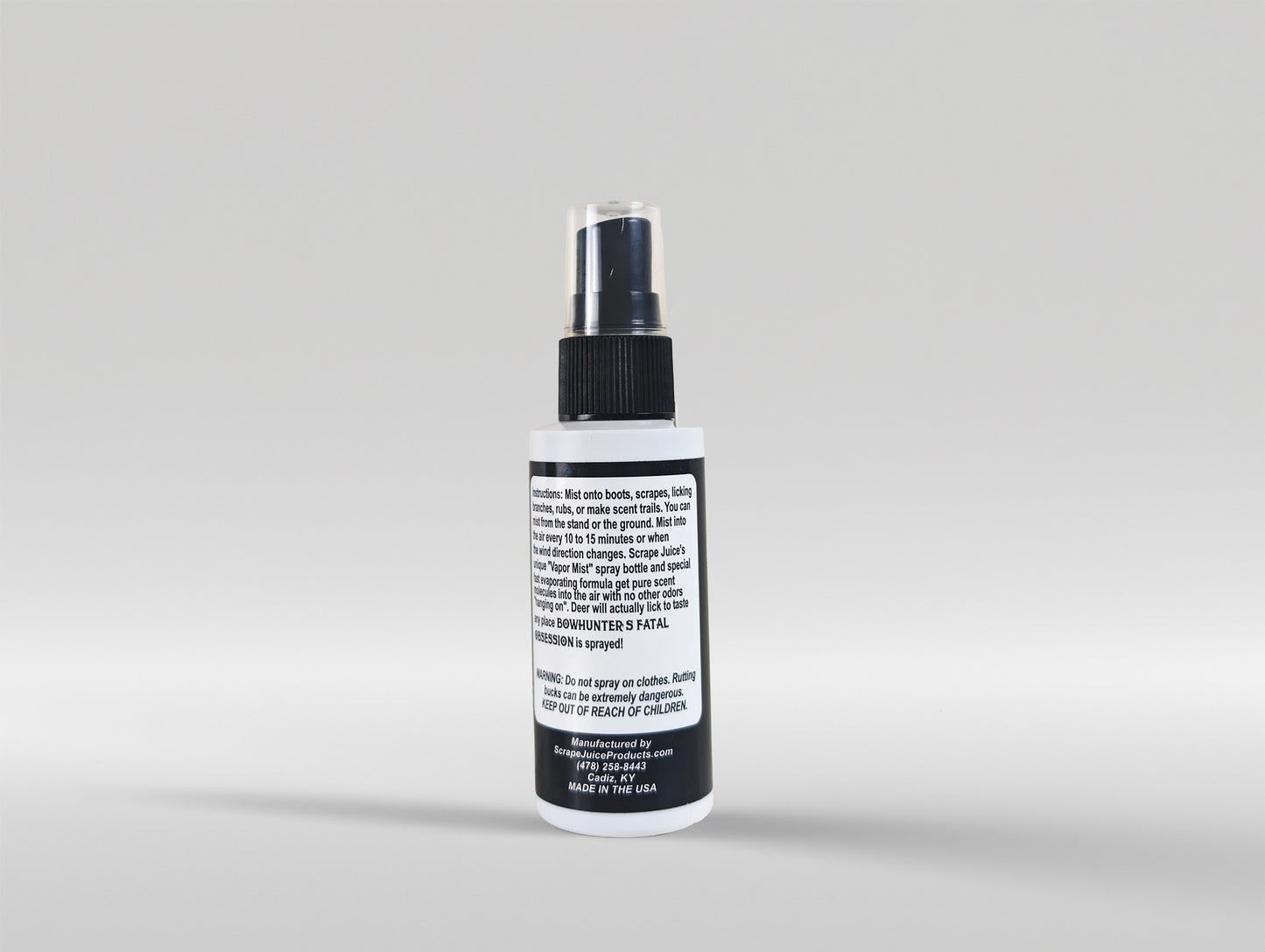 Bowhunter's Fatal Obsession Deer Lure / Deer Scrape 2 FL OZ Back View Without Product Card Image Of Whitetail Buck Smelling Scrape Juice Bottle In Tree